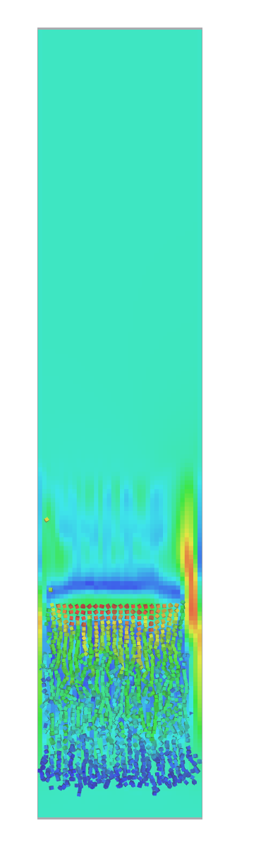 BlazeViewer showing a CFD-DEM fluid bed with a CFD fluid slice and polyhedra
